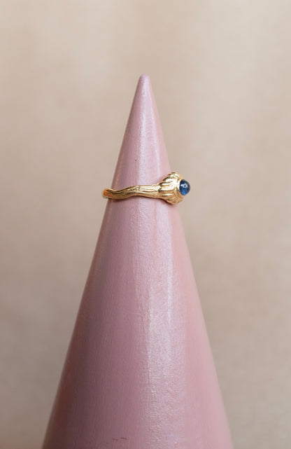 The Telga Ring - 18k + Blue Sapphire Cabochon